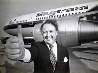 Sir Freddie Laker in front of one of the Skytrain DC-10s
